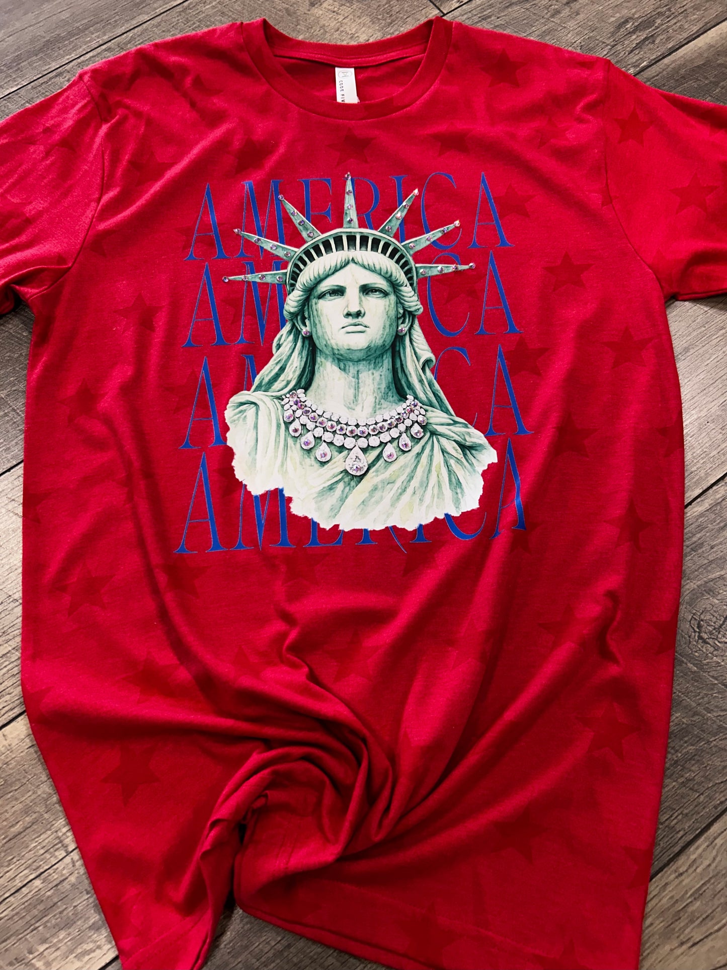 BeDazzled Lady Liberty on Code Five - Star Print Tee Red